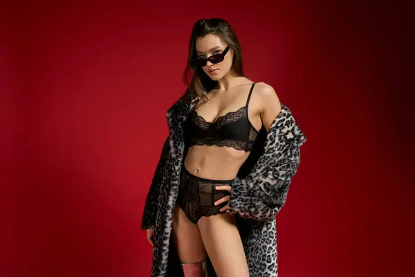 Seductive woman in lingerie striking a pose. — стоковое фото