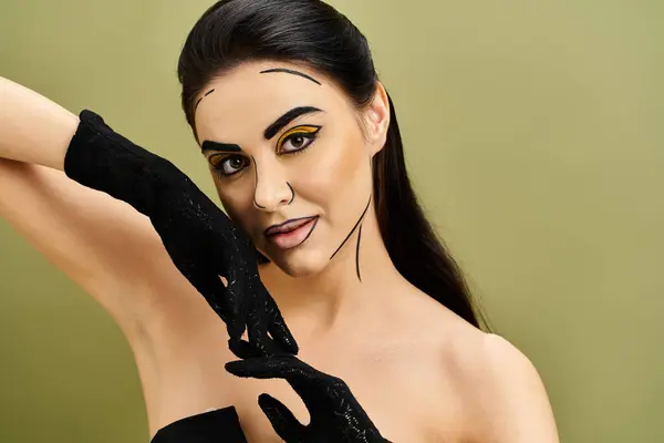 A stylish brunette in a black gloves, embodying a sense of mystery and allure with a pop art inspired makeup look. — Stock Photo