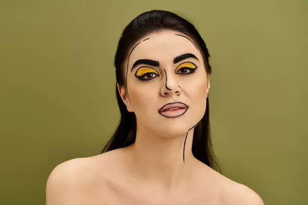 Brunette woman dons pop art makeup with yellow eyes — Stock Photo