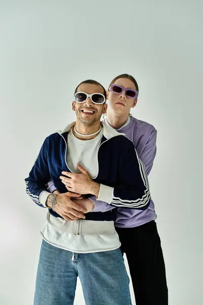 Two men standing closely with arms around each other, sharing a moment of connection. — Stock Photo