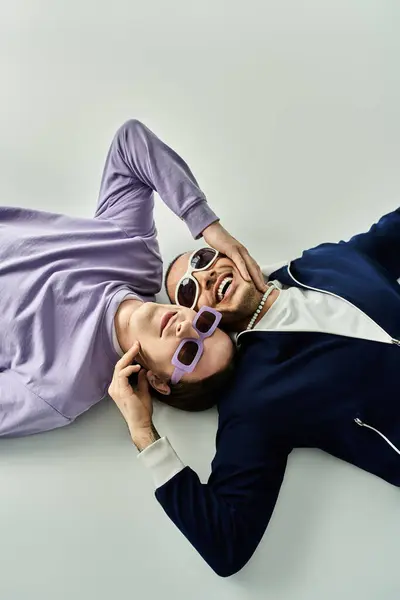 Two men lying together. — Stock Photo