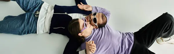 Two men entwined gracefully in a tender moment of connection. — Stock Photo