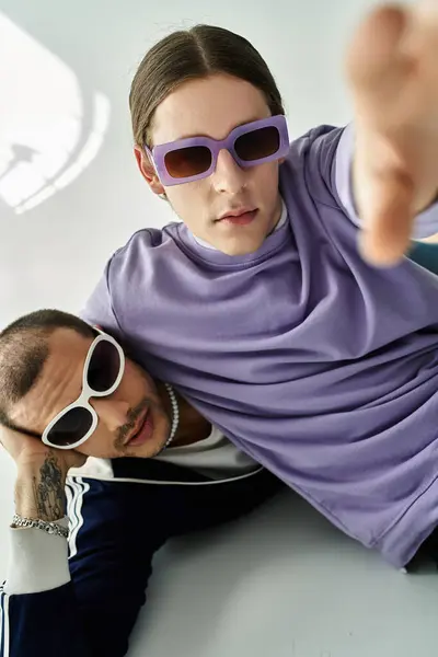Two men pose together for a picture. — Stock Photo