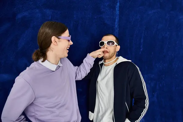 A man delicately posing with his partner. — Stock Photo