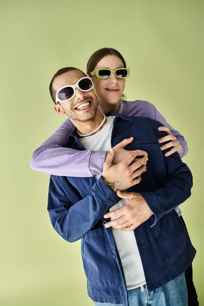 A couple of people, two men, hugging each other in a warm embrace, showing affection. — Stock Photo