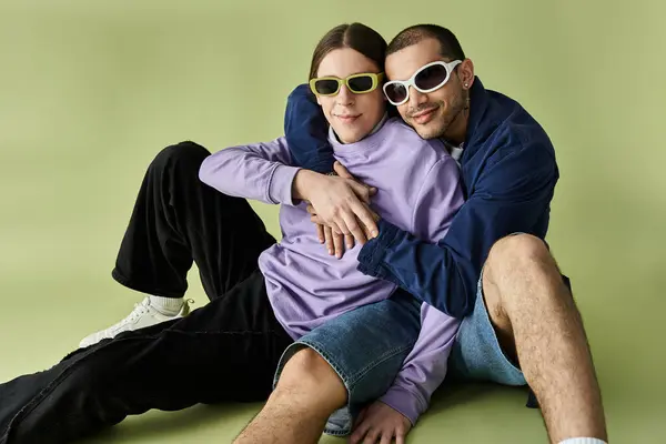 Two men sitting together on the floor, sharing quality time. — Stock Photo