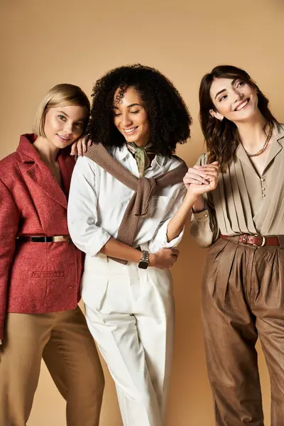 A group of young, beautiful multicultural women standing in stylish attire, showcasing friendship and cultural diversity. — Stock Photo