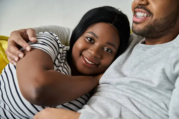 African American couple shares a quiet moment at home, woman rests on shoulder. — Stock Photo