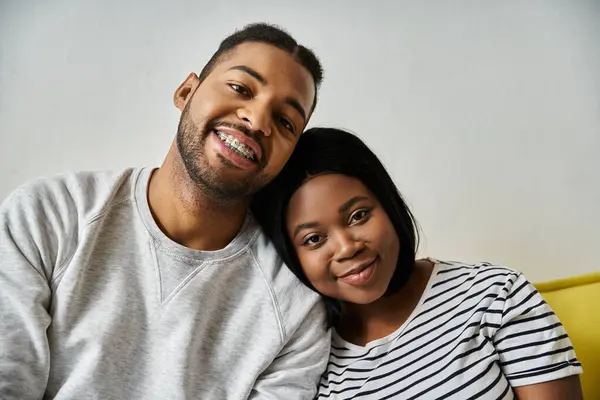 A happy African American couple enjoys a cozy moment together at home. — Stock Photo