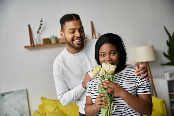 A loving African American couple enjoying a moment together at home. — Stock Photo