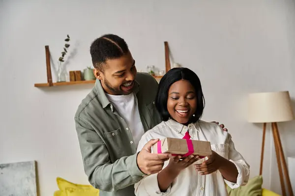 A couple enjoys a romantic moment together at home. — Stock Photo