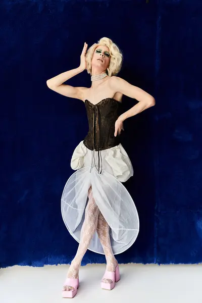 A vibrant drag artist showcases their unique style with confidence. — Stock Photo