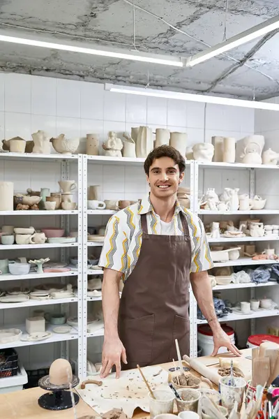 Joyous man in pottery studio. — Stock Photo