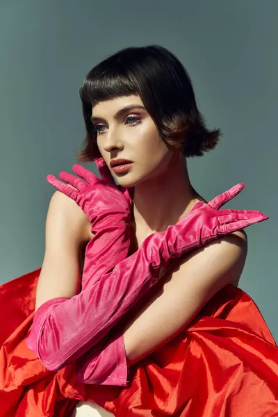 A stylish woman showcases her bold fashion choice with striking pose and vibrant colors. — Stock Photo