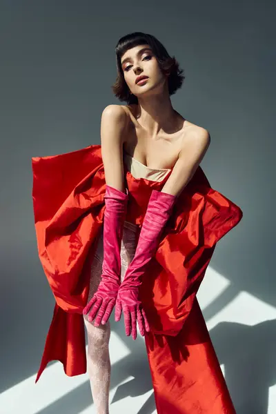 The young woman showcases a striking look with vibrant colors and bold fashion. — Stock Photo