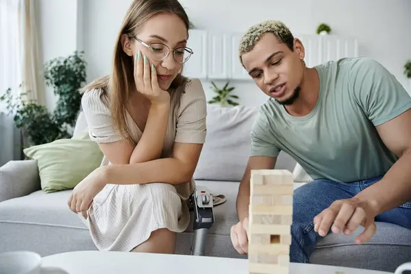 Two friends engage in a playful game at home. — Stock Photo