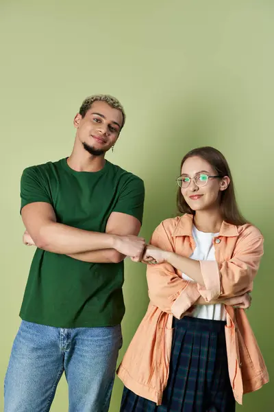 Friends share a lighthearted moment, embracing their unique styles together. — Stock Photo