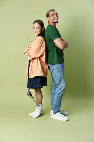 Two friends stand back to back, celebrating companionship and resilience together. — Stock Photo