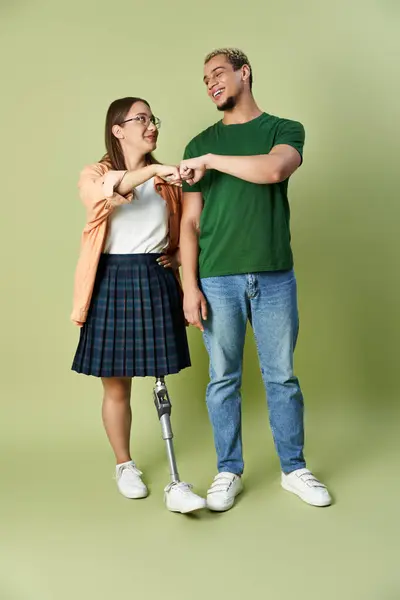 Friends enjoy a lighthearted fist bump, celebrating their unique bond. — Stock Photo