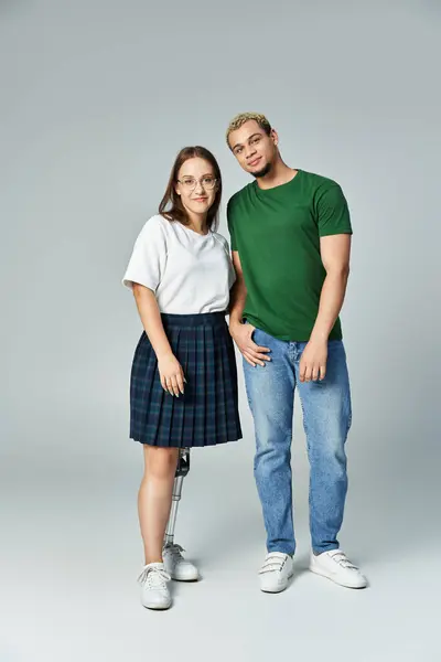 Two friends happily pose together, embracing their unique styles and friendship. — Stock Photo