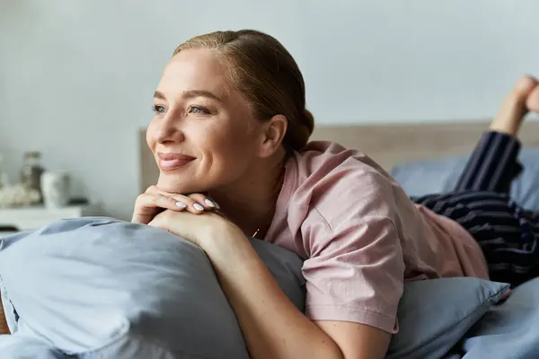 A young plus size woman enjoys a peaceful afternoon, lost in thought while lounging at home. — Stock Photo