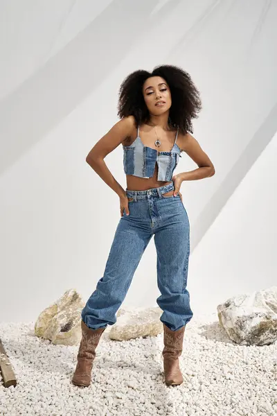 A stunning young African American woman poses confidently in trendy denim. — Stock Photo