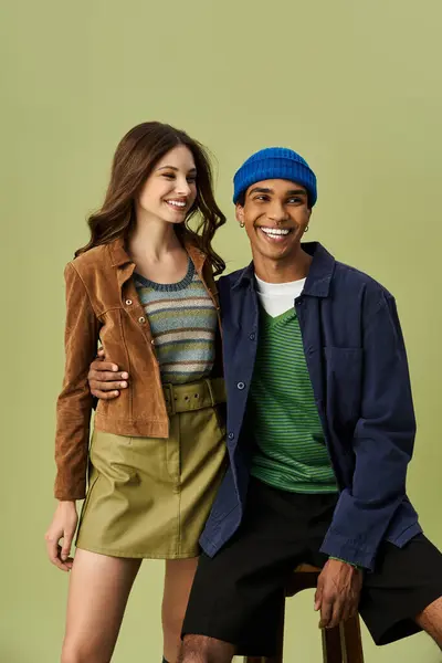 This fashionable duo showcases autumn styles with smiles, radiating joy in cozy attire. — Stock Photo