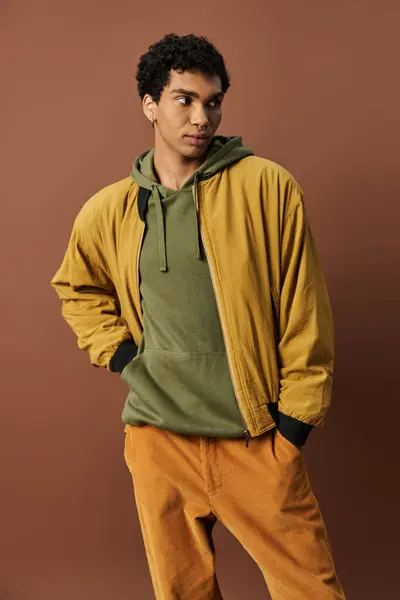 Stylish young man in vibrant attire. — Stock Photo