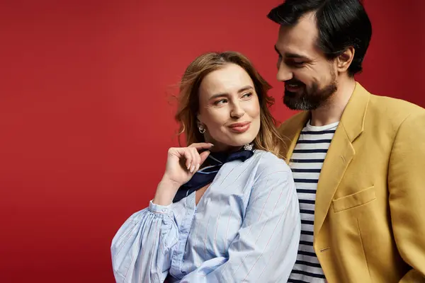 A middle aged couple shares a light hearted interaction, exuding charm and warmth. — Stock Photo
