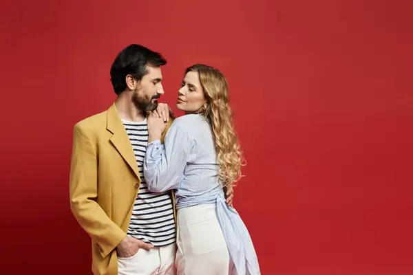 A middle aged couple enjoys a warm and playful moment, highlighting their connection. — Stock Photo