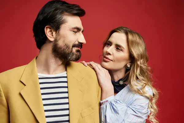 Middle aged duo engage in a loving exchange, showcasing warmth and connection. — Stock Photo