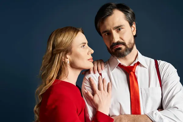 A middle aged couple shares an intimate moment, conveying emotions through their expressions. — Stock Photo