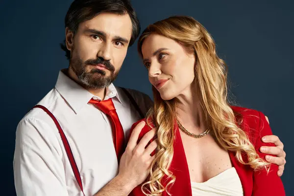 Two individuals display a warm bond while dressed elegantly, exuding confidence and charm. — Stock Photo