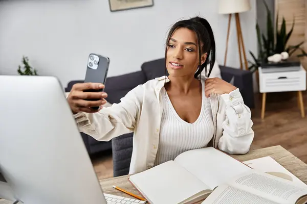 The young woman engages in her remote studies, sharing her learning journey online. — Stock Photo