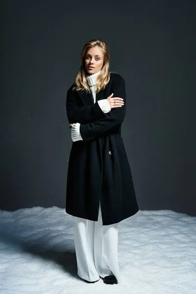 A young beautiful woman embraces the chill while showcasing her style in winter fashion. — Stock Photo