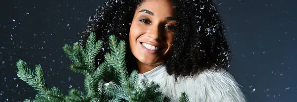An elegant woman enjoys a winter wonderland, wearing a chic ski suit and cozy faux fur jacket. — Stock Photo
