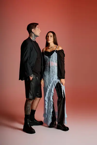Two young attractive models showcase fashionable outfits in a stylish setting, exuding confidence. — Stock Photo