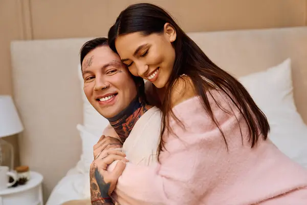 Couple embraces warmly, showcasing their deep connection in a serene, inviting space — Stock Photo