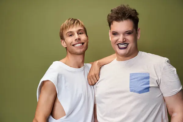 Two friends share joy and pride, smiling brightly in a moment of togetherness. — Stock Photo