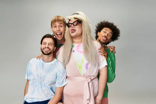 Four friends proudly showcase their vibrant fashion and celebrate LGBTQ identity. — Stock Photo