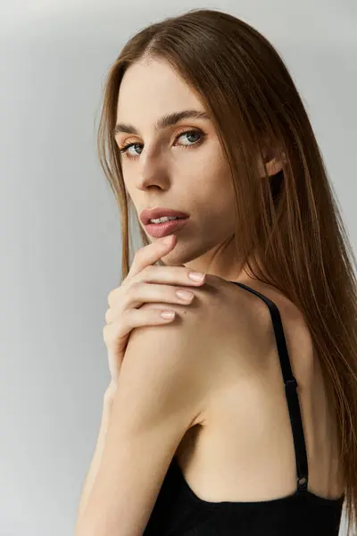Portrait of a young woman revealing her struggle with anorexia through her expression and posture. — Stock Photo