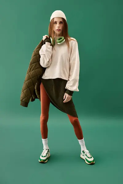 A young woman poses confidently in a stylish outfit while reflecting her inner battle with anorexia. — Stock Photo