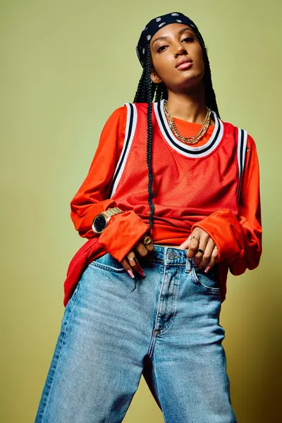 Stylish young woman poses with confidence in trendy casual wear, showcasing her unique vibe. — Stock Photo