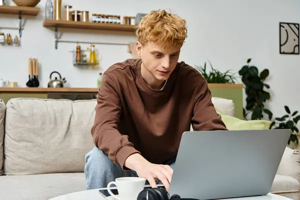 Redhead man interacts with his Australian Shepherd dog while relaxing in a stylish apartment. — Stock Photo