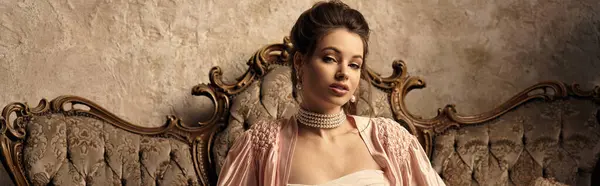 Young woman embodies a mystical nymph in vintage garments against an ornate backdrop. — Stock Photo