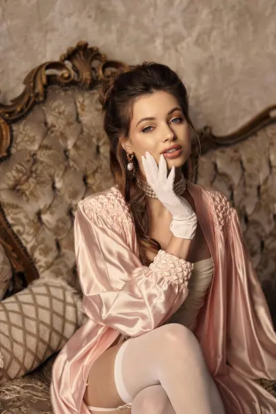 Young woman embodies fantasy with elegance, dressed in vintage style while poised gracefully. — Stock Photo