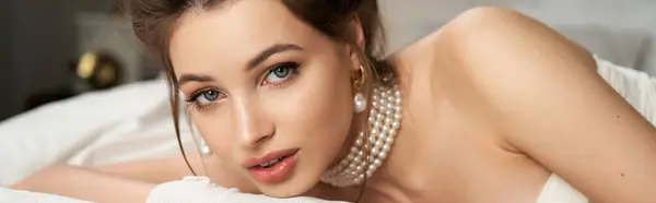 A stunning young woman enchants in a whimsical vintage setting, exuding elegance. — Stock Photo