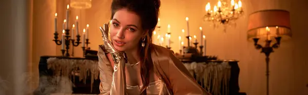 Uma jovem mulher transpira uma aura de magia, capturando a essência de um vampiro em meio à luz de velas. — Fotografia de Stock