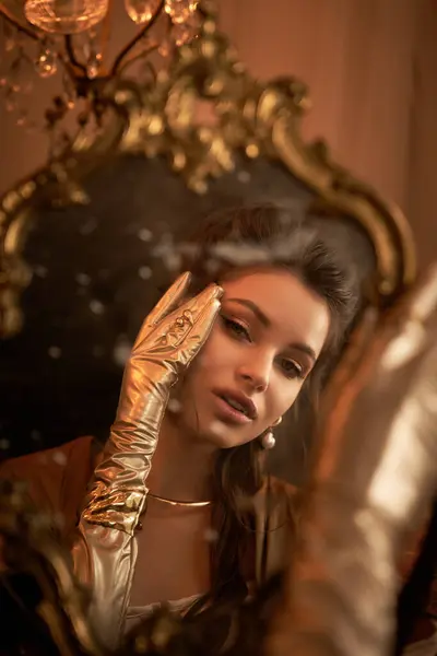 Mystical young woman reflects on her enchanting surroundings, embodying vampiric allure in twilight. — Stock Photo