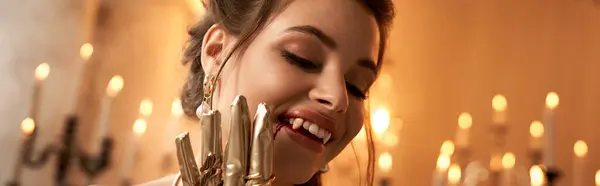 A young woman with striking features exudes a mystical vampire allure in her surroundings. — Stock Photo